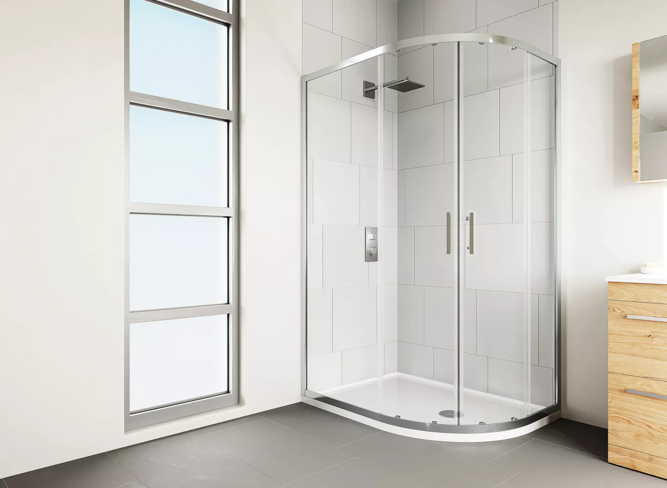 A sleek, modern shower door with curved glass and chrome finish
